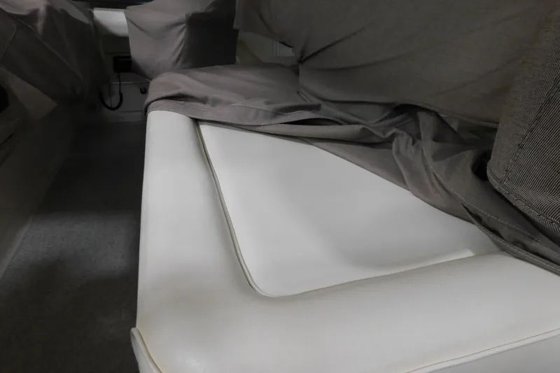  Yacht Photos Pics 1999 Sea Ray 500 Sundancer interior with covered seating area.