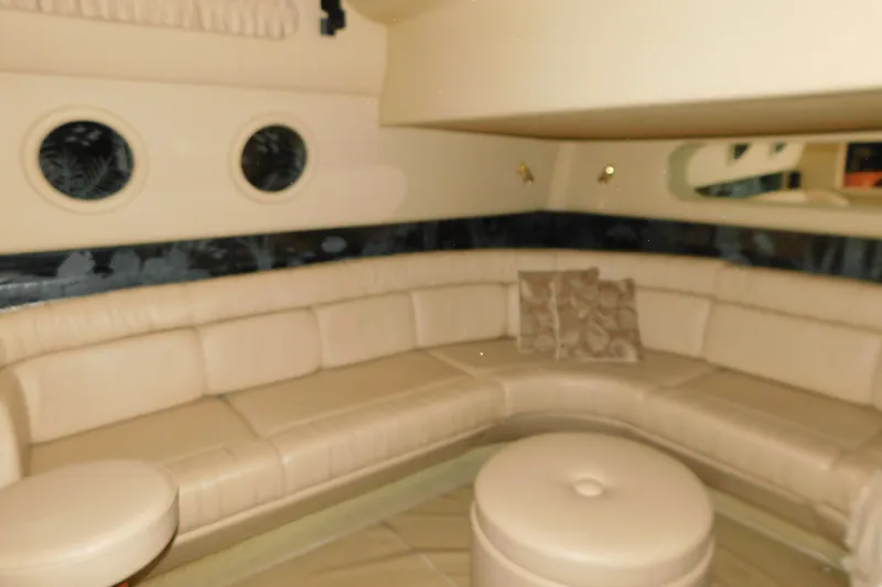  Yacht Photos Pics Luxurious interior of 1999 Sea Ray 500 Sundancer yacht with beige leather seating.