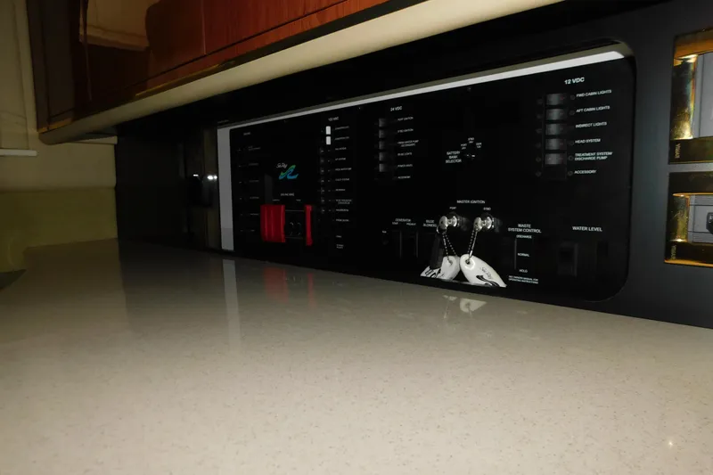  Yacht Photos Pics Control panel of a 1999 Sea Ray 500 Sundancer yacht interior.