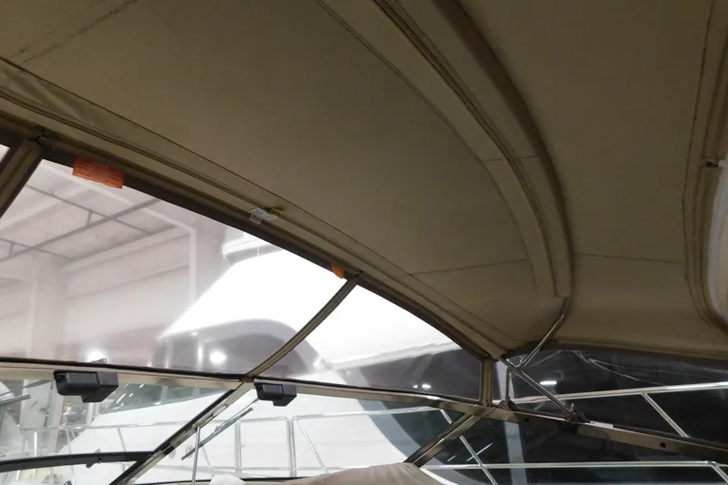  Yacht Photos Pics Interior view of 1999 Sea Ray 500 Sundancer boat with beige canopy.