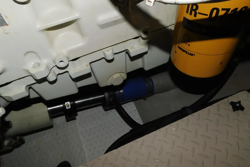  Yacht Photos Pics Engine compartment of 1999 Sea Ray 500 Sundancer with visible Caterpillar oil filter.