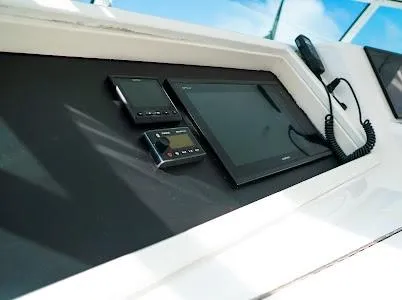 My Way Yacht Photos Pics Control panel of a 1999 Viking Express boat with navigation equipment.