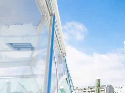 My Way Yacht Photos Pics Side view of a 1999 Viking Express boat against a clear blue sky.