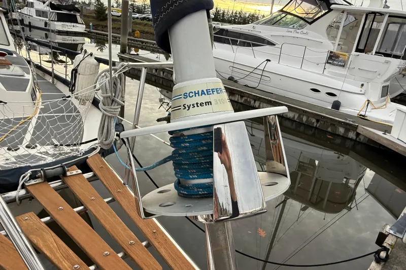  Yacht Photos Pics 1980 Nauticat Pilothouse sailboat docked, featuring Schaefer System 3100, with nearby yachts.