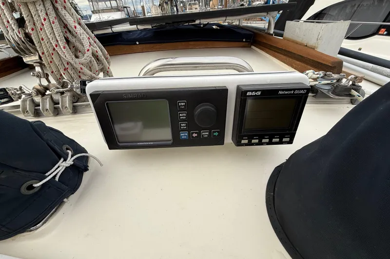  Yacht Photos Pics 1980 Nauticat Pilothouse sailboat cockpit with navigation instruments and rigging ropes.