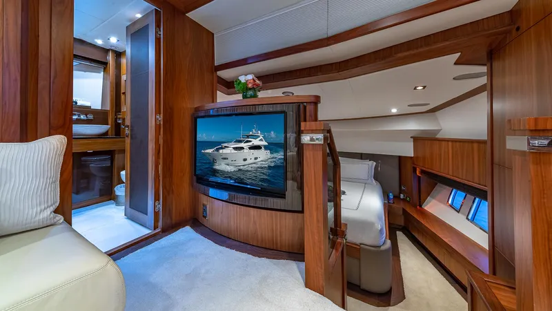 Emrys Yacht Photos Pics Luxurious interior of 2010 Sunseeker Flybridge yacht with wood paneling and modern amenities.