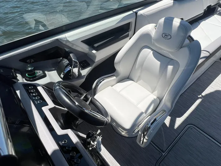  Yacht Photos Pics 2022 Cobalt R8 Outboard boat interior with sleek steering and luxurious seating.