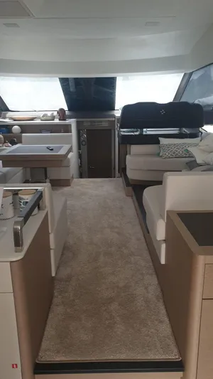  Yacht Photos Pics Luxurious interior of a 2020 Prestige 590 yacht with modern furnishings.