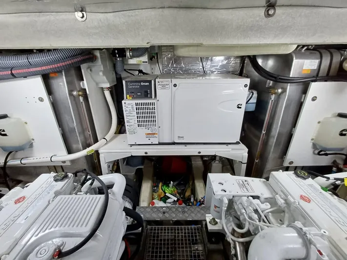  Yacht Photos Pics Engine room of a 2020 Prestige 590 yacht with Cummins Onan generator.