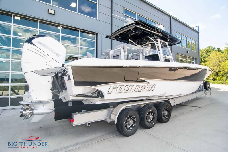  Yacht Photos Pics 2023 Fountain 38 SC boat on a trailer outside Big Thunder Marine dealership.
