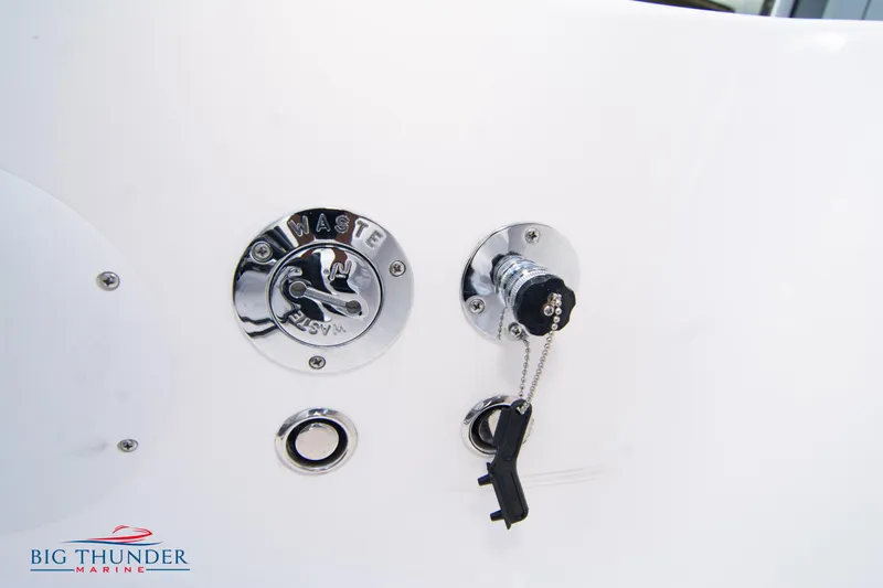  Yacht Photos Pics Close-up of 2023 Fountain 38 SC boat waste and fuel ports.