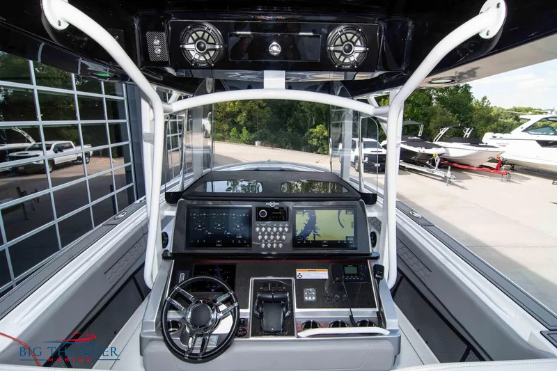  Yacht Photos Pics 2023 Fountain 38 SC boat dashboard with advanced navigation and control systems.