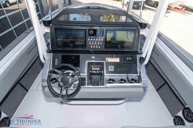  Yacht Photos Pics 2023 Fountain 38 SC boat dashboard with advanced navigation and control systems.