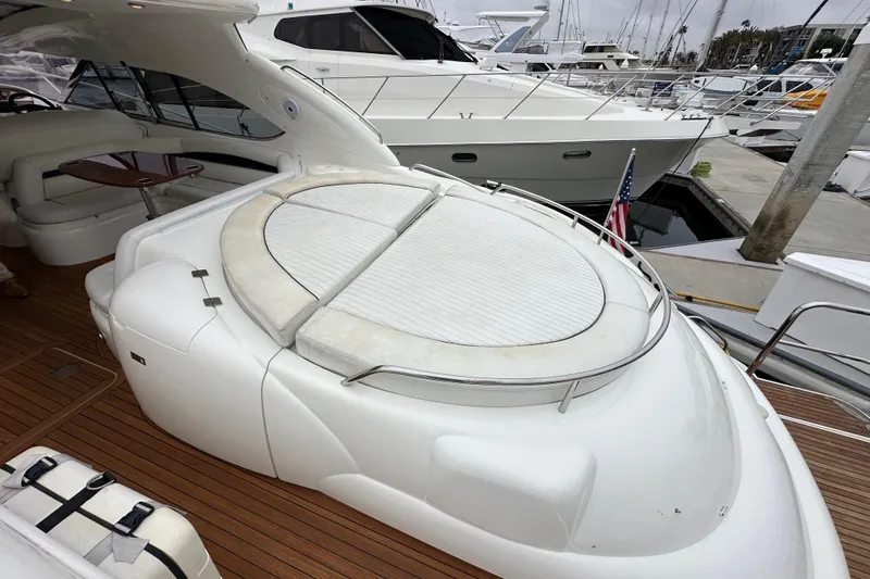 D Yacht Photos Pics Luxurious 2000 Sunseeker Predator 60 yacht with spacious deck and elegant seating area.