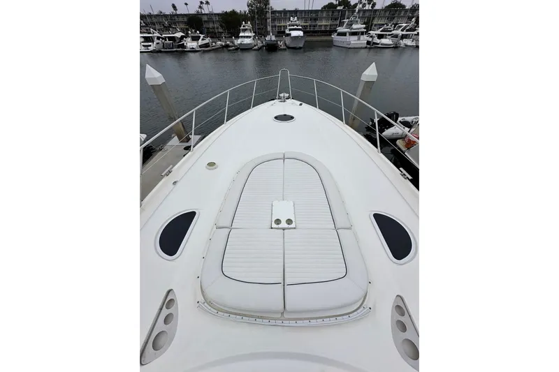 D Yacht Photos Pics Sunseeker Predator 60 yacht deck, 2000 model, docked in a marina.