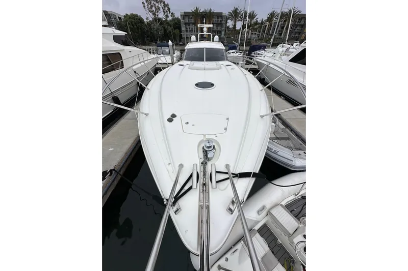 D Yacht Photos Pics Sunseeker Predator 60 yacht, 2000 model, docked at marina, front view.