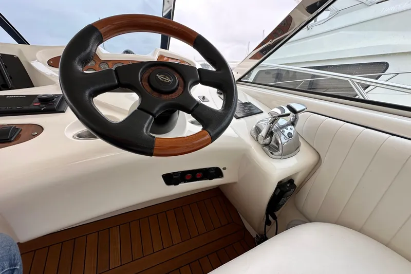 D Yacht Photos Pics Steering wheel and controls of a 2000 Sunseeker Predator 60 yacht.