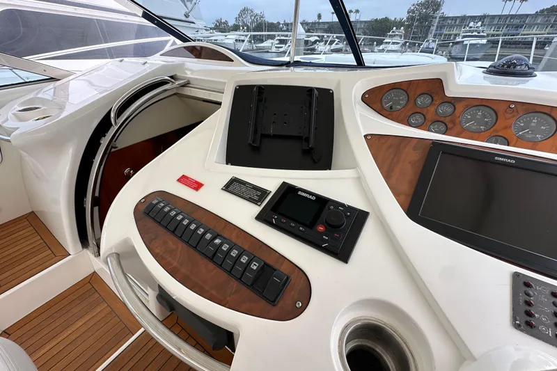 D Yacht Photos Pics Cockpit of 2000 Sunseeker Predator 60 yacht with navigation controls and dashboard.