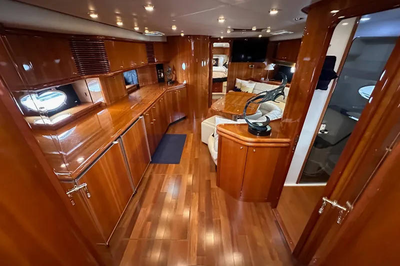 D Yacht Photos Pics Luxurious interior of 2000 Sunseeker Predator 60 yacht with polished wood finishes.