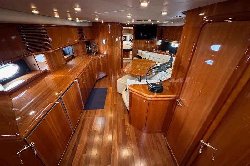D Yacht Photos Pics Luxurious interior of 2000 Sunseeker Predator 60 yacht with polished wood finishes.