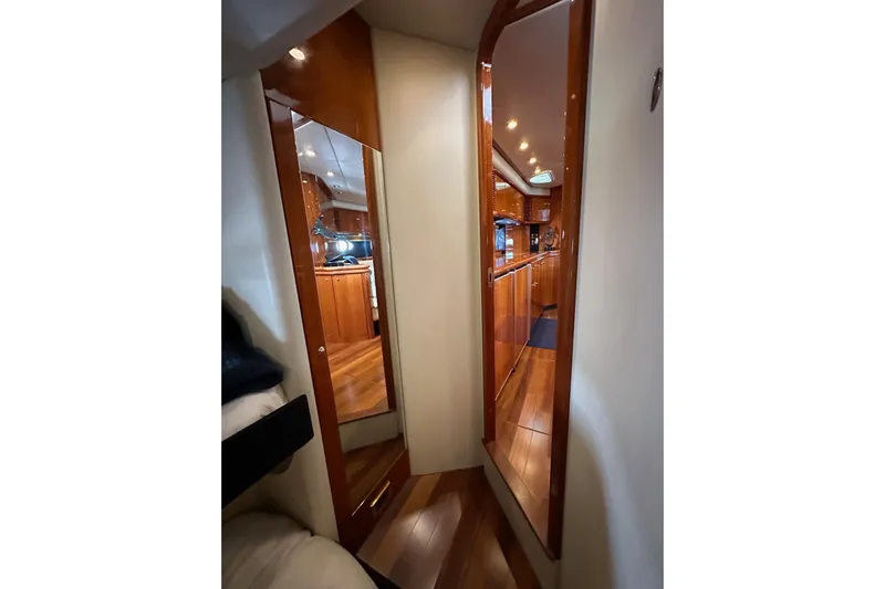 D Yacht Photos Pics Interior view of 2000 Sunseeker Predator 60 yacht, featuring polished wood finishes.