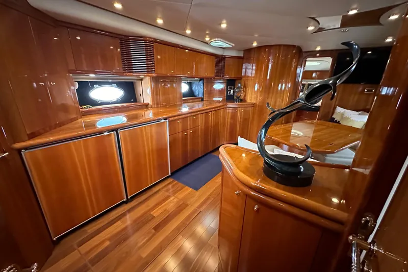 D Yacht Photos Pics Luxurious interior of 2000 Sunseeker Predator 60 yacht with polished wood finishes.