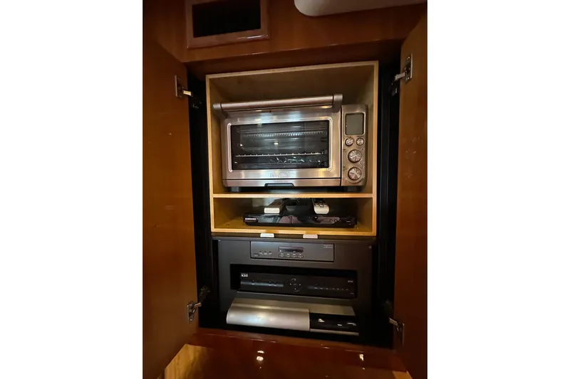 D Yacht Photos Pics Built-in kitchen appliances on Sunseeker Predator 60 yacht, 2000 model.