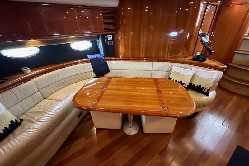 D Yacht Photos Pics Luxurious Sunseeker Predator 60 yacht interior with elegant wood finishes and plush seating, year 2000.