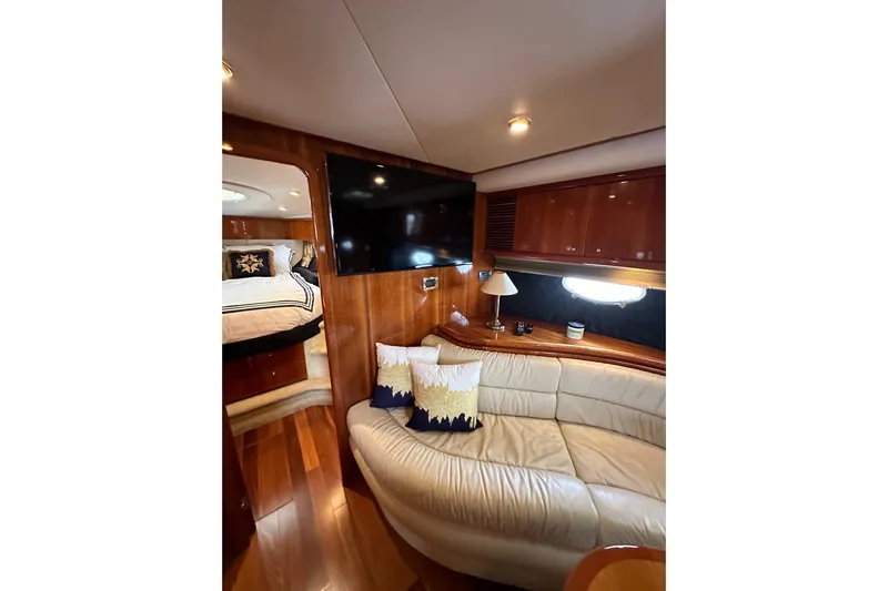 D Yacht Photos Pics Luxurious interior of 2000 Sunseeker Predator 60 yacht with leather seating and modern amenities.