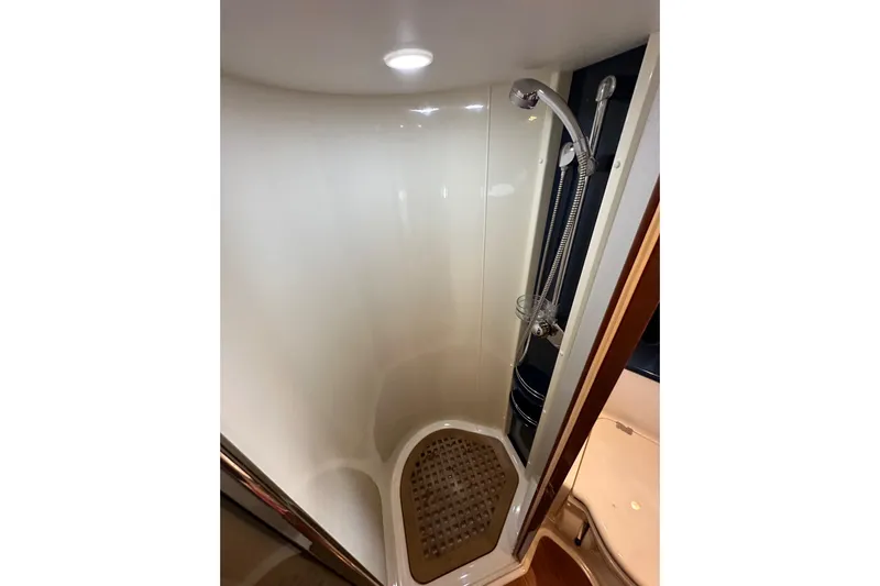 D Yacht Photos Pics Shower area in 2000 Sunseeker Predator 60 yacht, featuring modern fixtures and lighting.