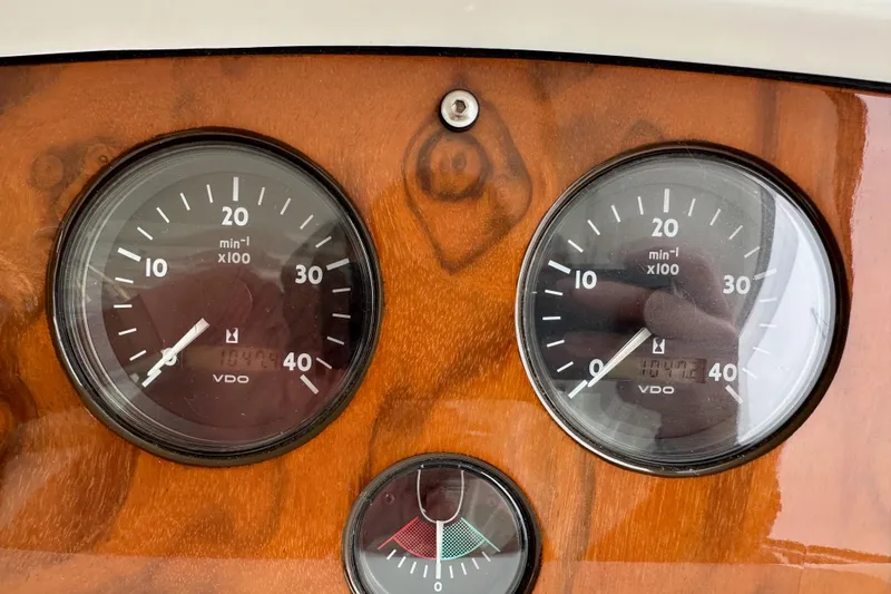 D Yacht Photos Pics Sunseeker Predator 60 2000 dashboard with VDO gauges on wooden panel.