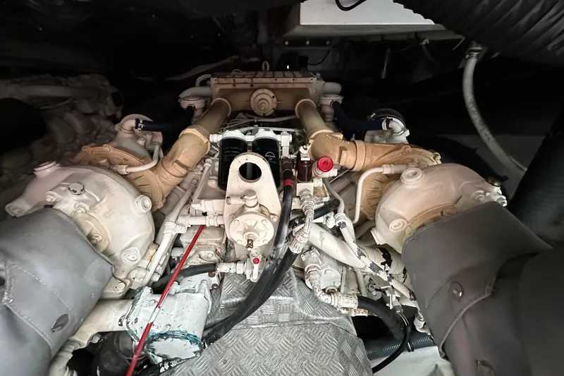 D Yacht Photos Pics Engine compartment of a 2000 Sunseeker Predator 60 yacht, showcasing mechanical components.