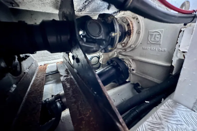 D Yacht Photos Pics Engine compartment of a 2000 Sunseeker Predator 60 yacht, showcasing mechanical components.