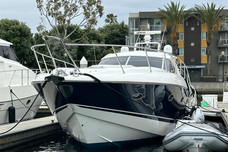 D Yacht Photos Pics Luxury Sunseeker Predator 60 yacht docked at marina, 2000 model.