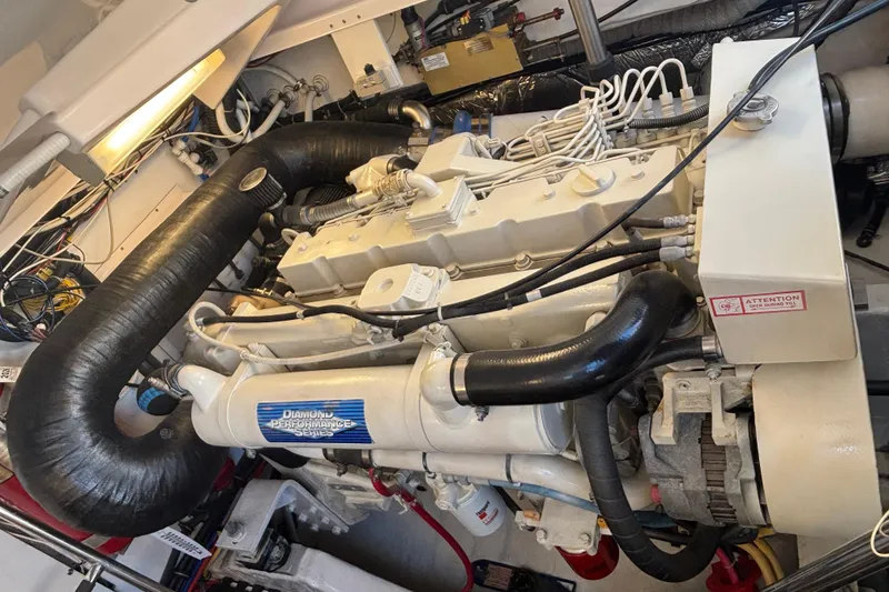 Salina Yacht Photos Pics Engine room of a 2004 Tiara Yachts 3600 Sovran, featuring a powerful marine engine.