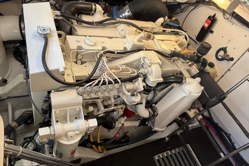 Salina Yacht Photos Pics Engine compartment of a 2004 Tiara Yachts 3600 Sovran, showcasing detailed mechanical components.