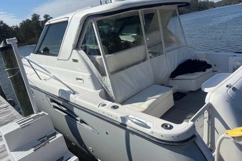 Salina Yacht Photos Pics 2004 Tiara Yachts 3600 Sovran docked, featuring sleek design and comfortable seating.