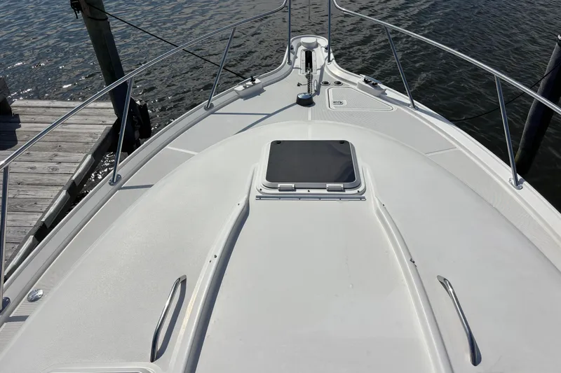 Salina Yacht Photos Pics 2004 Tiara Yachts 3600 Sovran bow view, docked by the water.