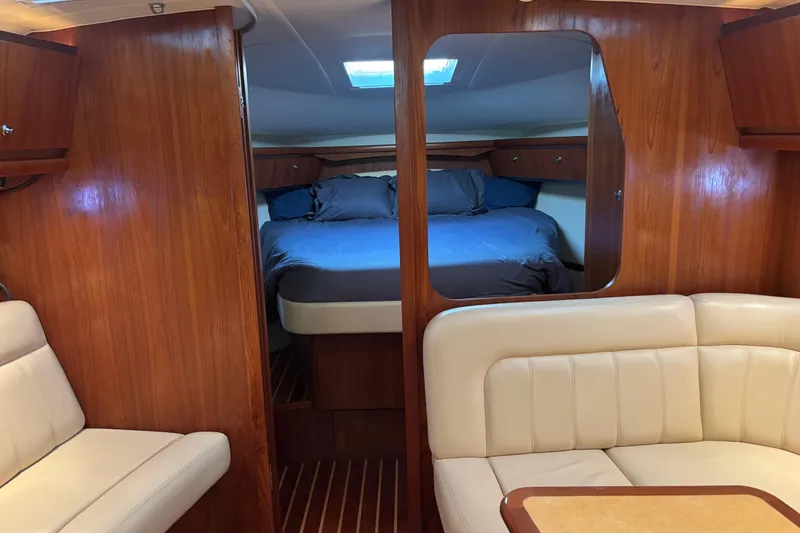 Salina Yacht Photos Pics 2004 Tiara Yachts 3600 Sovran interior with cozy cabin and elegant wood finish.