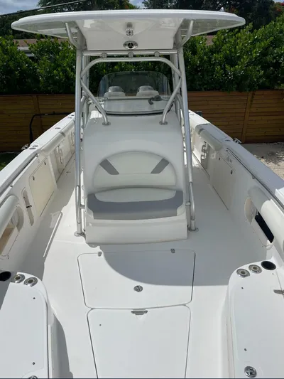  Yacht Photos Pics 2005 Boston Whaler 320 Outrage boat with spacious deck and seating.
