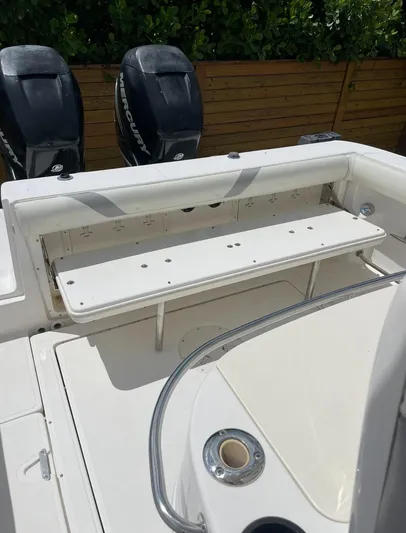  Yacht Photos Pics 2005 Boston Whaler 320 Outrage boat interior with dual Mercury engines.