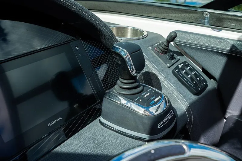 Dreamaker Yacht Photos Pics 2021 Regal 29 OBX boat dashboard with Garmin display and joystick controls.