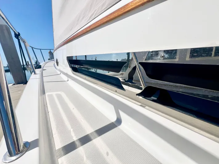 Risk & Reward Yacht Photos Pics 2022 Back Cove 39O yacht deck with sleek design and chrome accents.