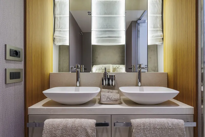  Yacht Photos Pics Luxury bathroom with dual sinks in 2025 Cranchi 62 Sessantadue yacht.