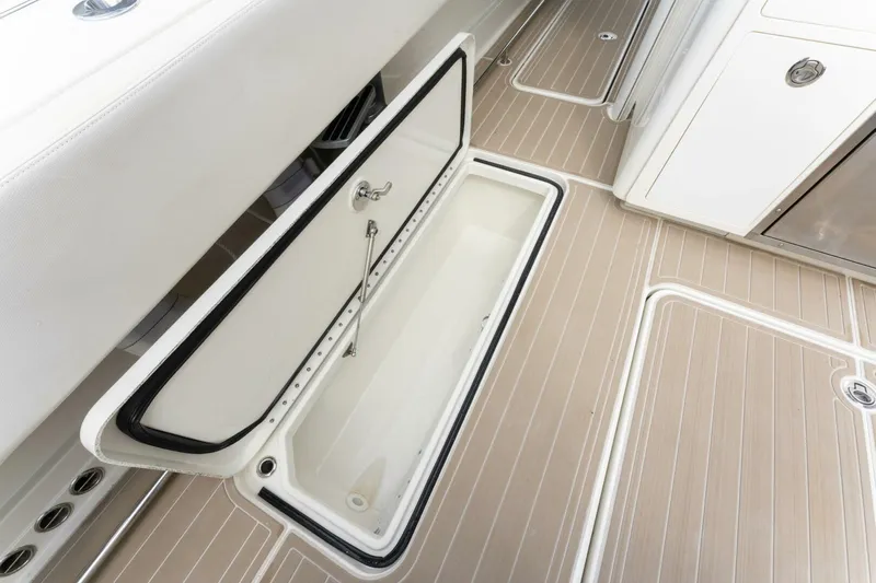  Yacht Photos Pics 2018 Hydra-Sports 4200 Siesta boat storage compartment with open hatch on deck.