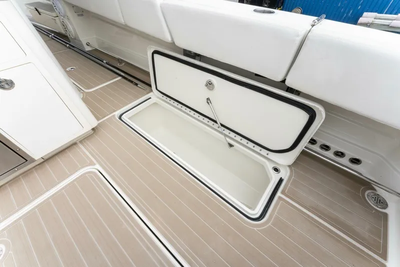  Yacht Photos Pics 2018 Hydra-Sports 4200 Siesta boat deck with open storage compartment.