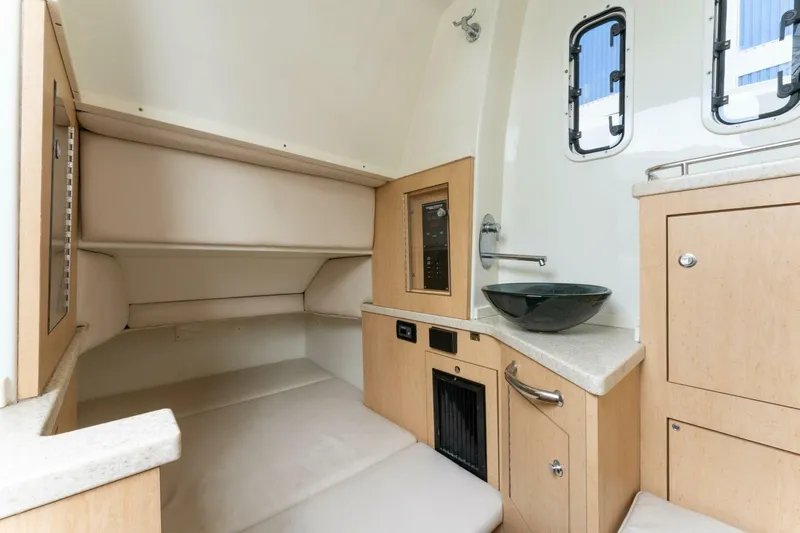  Yacht Photos Pics 2018 Hydra-Sports 4200 Siesta cabin interior with modern amenities and sleek design.