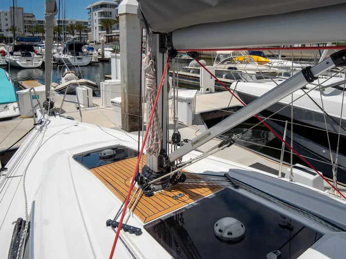 Anthem Yacht Photos Pics 2022 Dehler 34 sailboat docked at marina, showcasing deck and rigging details.