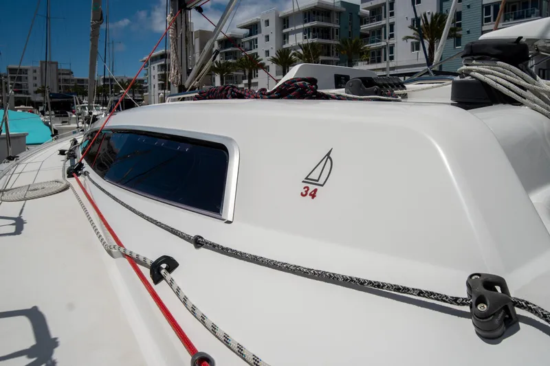 Anthem Yacht Photos Pics 2022 Dehler 34 sailboat docked, showcasing sleek design and modern rigging.