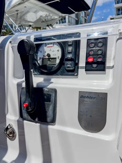 Anthem Yacht Photos Pics Control panel of a 2022 Dehler 34 yacht with throttle and gauges.